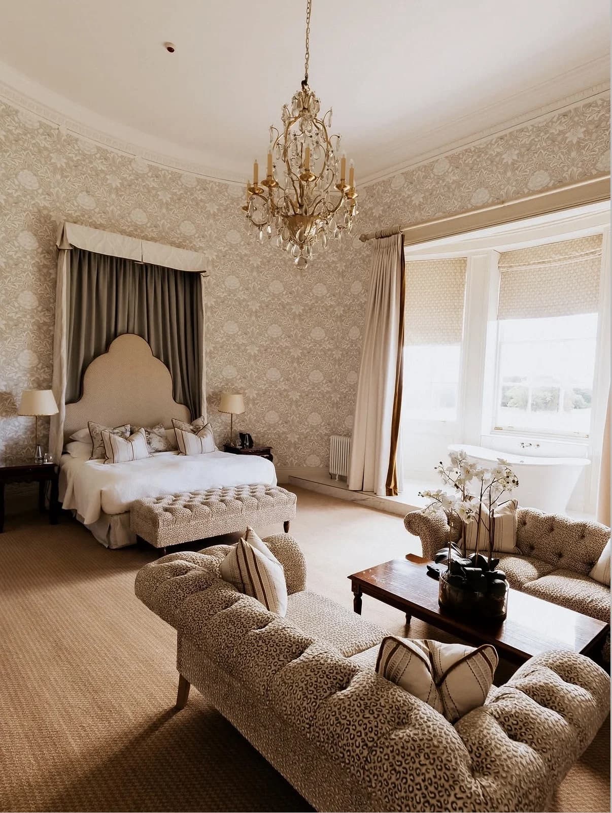 Bedroom and sitting area inside the Wynyard Hall accommodation suite